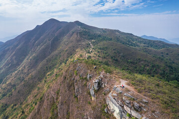 Fototapeta na wymiar hiking man on the mountain, epic aerial view of Pat Sin Leng