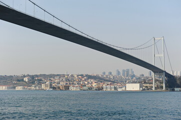 Istanbul / Turkey - 02.28.2017 : Coastal zone and architecture of the Bosphorus Strait. A bridge connecting Europe and Asia.