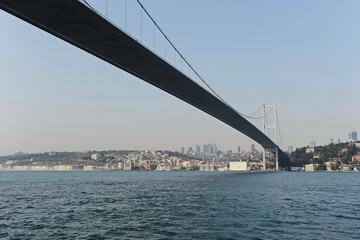 Istanbul / Turkey - 02.28.2017 : Coastal zone and architecture of the Bosphorus Strait. A bridge connecting Europe and Asia.