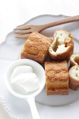 Asian  deep dried bun served with cream cheese 