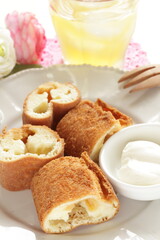 Asian  deep dried bun served with cream cheese 