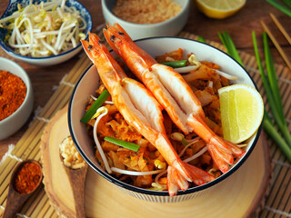 Authentic pad thai noodle with shrimp, a traditional thai food.