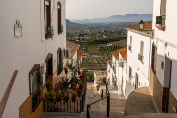 narrow hillside street in the picturesque Andalusian village of Alora