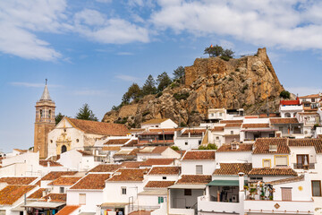 Fototapeta na wymiar the historic whitewashed Andalusian village of Ardales with its church and Moorish castle ruins