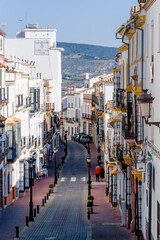 vertical view of the picturesque whitewashed village of Olvera in Andalusia