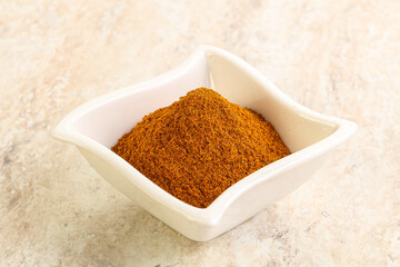 Dry Paprika powder in the bowl