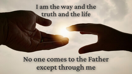 Close up of two hand reaching out shining light with text - I am the way and the truth and the...