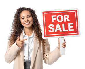 African-American real estate agent with "For Sale" sign on white background