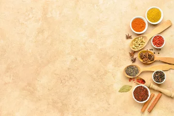 Gordijnen Set with aromatic spices on beige background © Pixel-Shot
