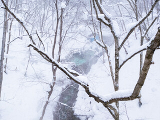 Hot springs in a snowy valley (Zao-onsen ski resort, Yamagata, Japan)