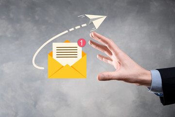 Businessman hand holding e-mail icon, Contact us by newsletter email and protect your personal...