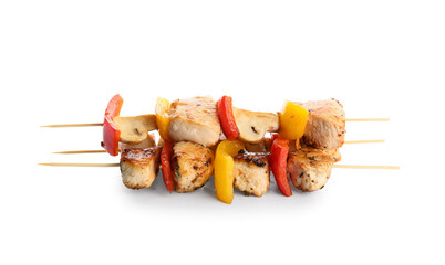 Grilled chicken skewers with vegetables isolated on white background