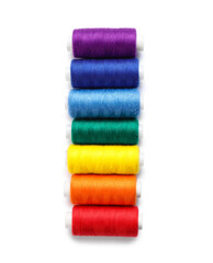 Beautiful sewing threads on white background