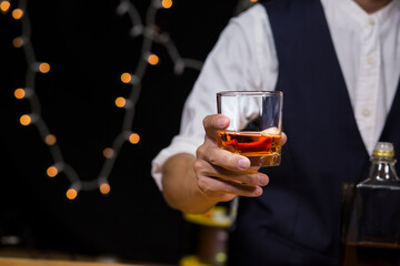 Bartender Serve Whiskey, on wood bar, 