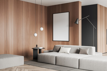 Corner view on bright living room interior with empty poster