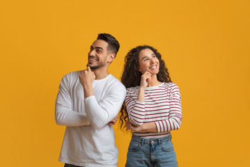 Fototapeta premium Pensive Arab Man And Woman Thinking About Something And Looking Away