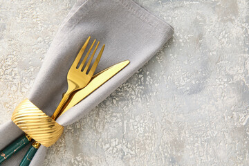 Elegant cutlery on grunge background