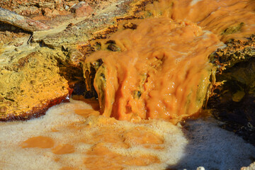 Orange river of poison from a gold mine - environment disaster pollution