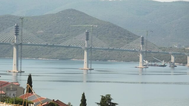 Peljesac Bridge in Croatia. Peljesac Bridge links the southeastern Croatian exclave to rest of the Croatia bypassing Bosnia Herzegovina. Under construction from 2018 to 2022 in Duboka village.