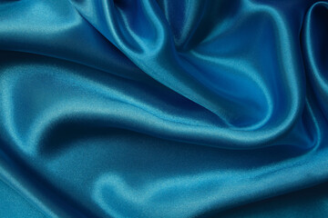 Dark blue fabric texture background, detail of silk or linen pattern.