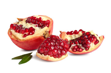 Tasty pomegranate pieces on white background