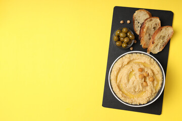 Concept of tasty food with hummus, space for text