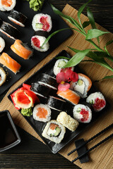 Concept of tasty food with sushi, top view