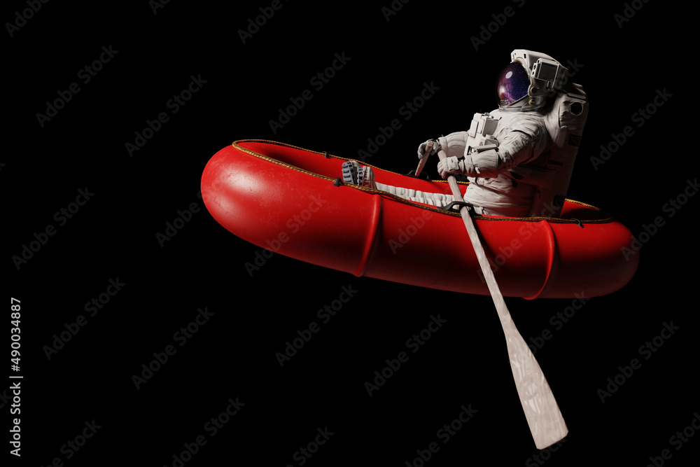 Canvas Prints astronaut in red dinghy, isolated on black background