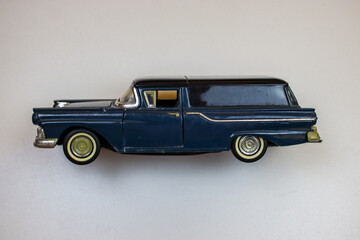 Vintage car toy, model on ehite background