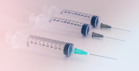 Medical syringes  on color background.