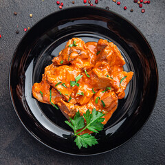 meat stewed tomato sauce pork beef chicken fresh healthy meal food diet snack on the table copy space food background 