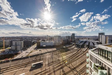 Foto auf Acrylglas Sunny day over the new main railway station Vienna © Creativemarc
