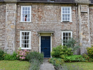 Fototapeta na wymiar beautiful old stone house and garden