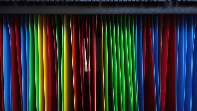 Close-up sliding shot of colored tabs