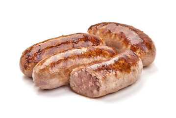 Grilled Munich sausages with green lettuce, isolated on white background.