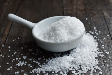 kitchen salt on wooden Table Background (table salt )