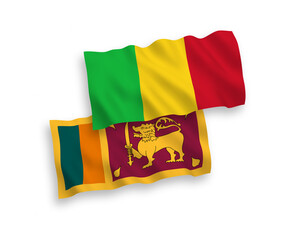 Fototapeta premium National vector fabric wave flags of Sri Lanka and Mali isolated on white background. 1 to 2 proportion.