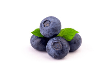 Blueberry. Ripe blueberry with mint leaves on white isolated background.