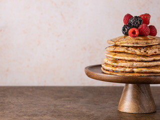 stack of pancakes with berries