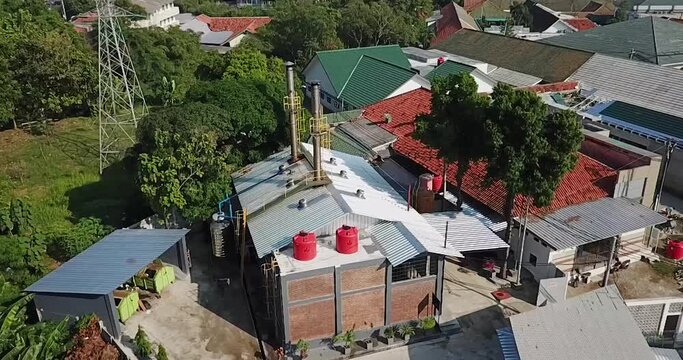 Aerial Incinerator chimney or chimney for burning waste in the hospital area. Drone View