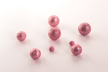 pink glitter balls, spherical on white background