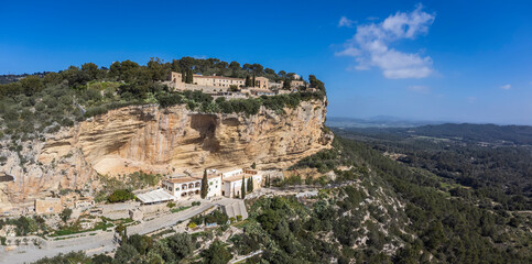 Fototapeta na wymiar Gracia and Sant Honorat Sanctuaries, on the steep cliffs of Puig de Cura, Algaida, Mallorca, Balearic Islands, Spain