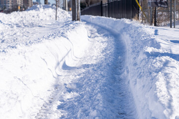 Snow cleared sidewalk