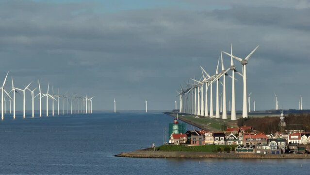 Wind turbines on coastline and offshore near Urk, Netherlands