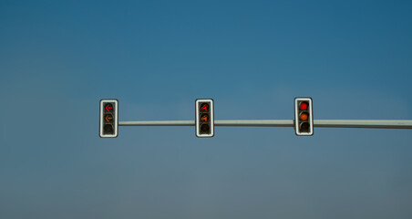 Traffic light with a view of the blue sky