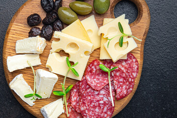 snack plate cheese, sausage, olive, bread stick fresh appetizer meal food snack on the table copy space food background