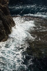 Sea waves, water detail, tide at sklalisk. Sea water in Mallorca, Spain.