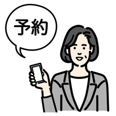 オンラインで予約をしているグレーのスーツを着た中年女性
