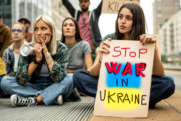 stop war in Ukraine, protests against european conflict, pacifist movement in the streets, banner...