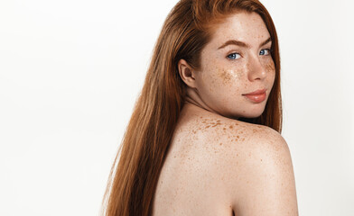 Beautiful plus size female model with long, natural red hair. Redhead chubby woman, head and...